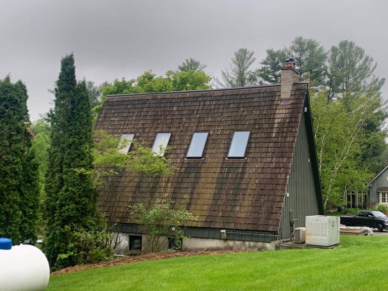 High pitch roof with cedar in need of replacement