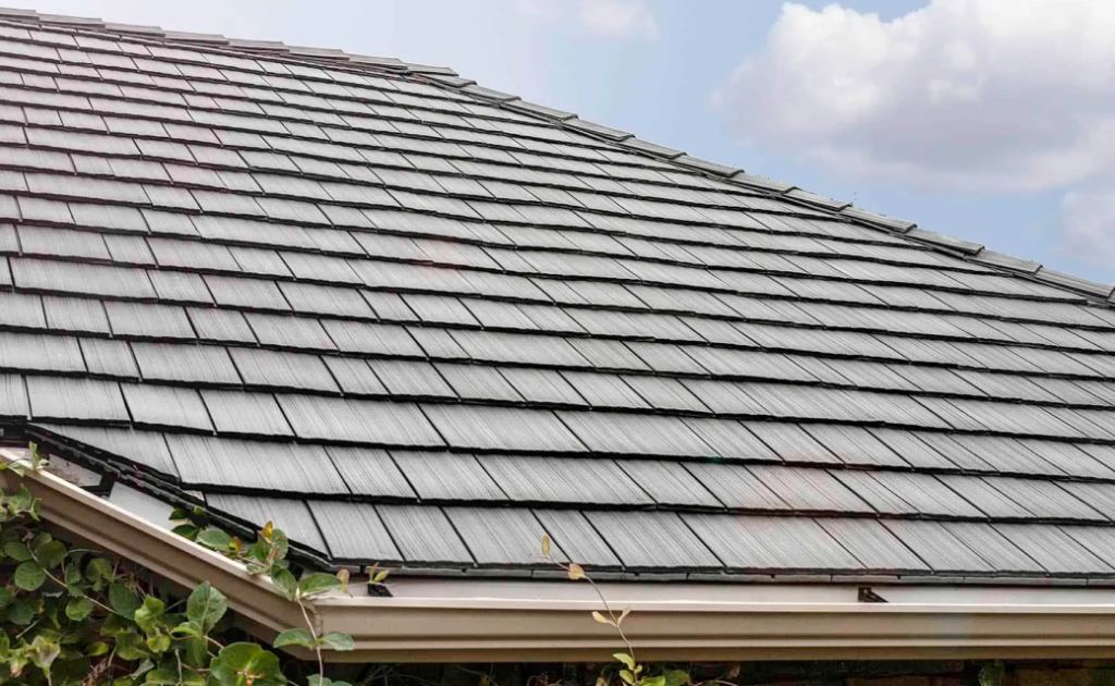 Closeup of Enviroshake composite roof with green leaves on it