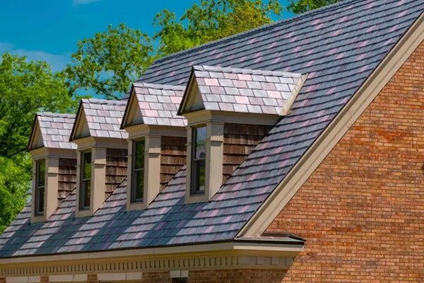 Closeup image of Enviroslate composite slate roof in a multi-tone of purple colours