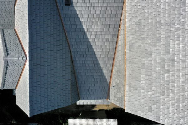 View of roof with Enviroshake Silvered Cedar composite roof tiles.