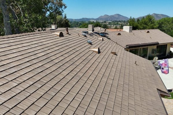View of roof with Enviroshake Aged Cedar composite roof tiles.